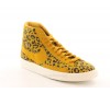 Basket Nike blazer mi haute jaune or avec motif leopard.